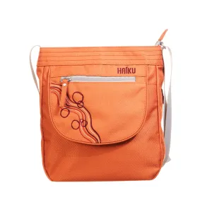 Haiku Jaunt Cross Body Bag in Rustic Clay,  Cherry Blossom, Stone Gray, Black in Bloom & Forest
