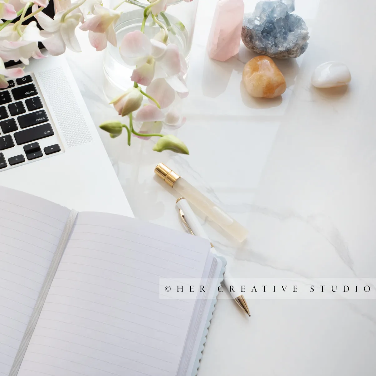 Notebook on Laptop and Crystals